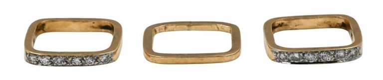 Three 14k yellow gold band rings