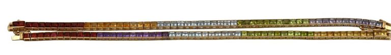 Two 14k yellow gold multi-colored gemstone bracelets
