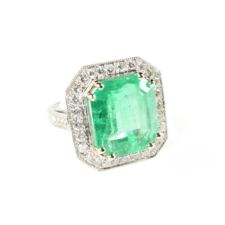 Platinum diamond emerald ring