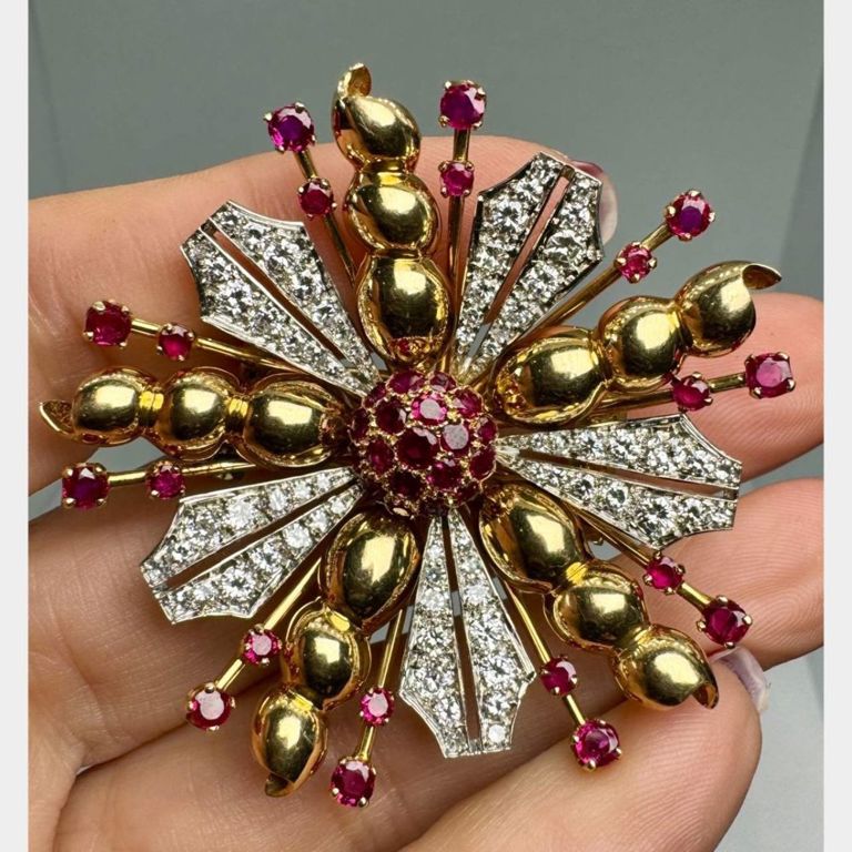 18k yellow gold ruby and diamond starburst brooch