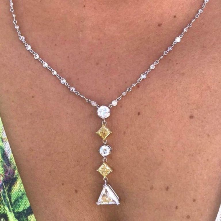 Platinum diamond necklace with 18k yellow gold diamond pendant