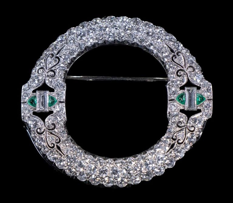 Platinum diamond and emerald brooch
