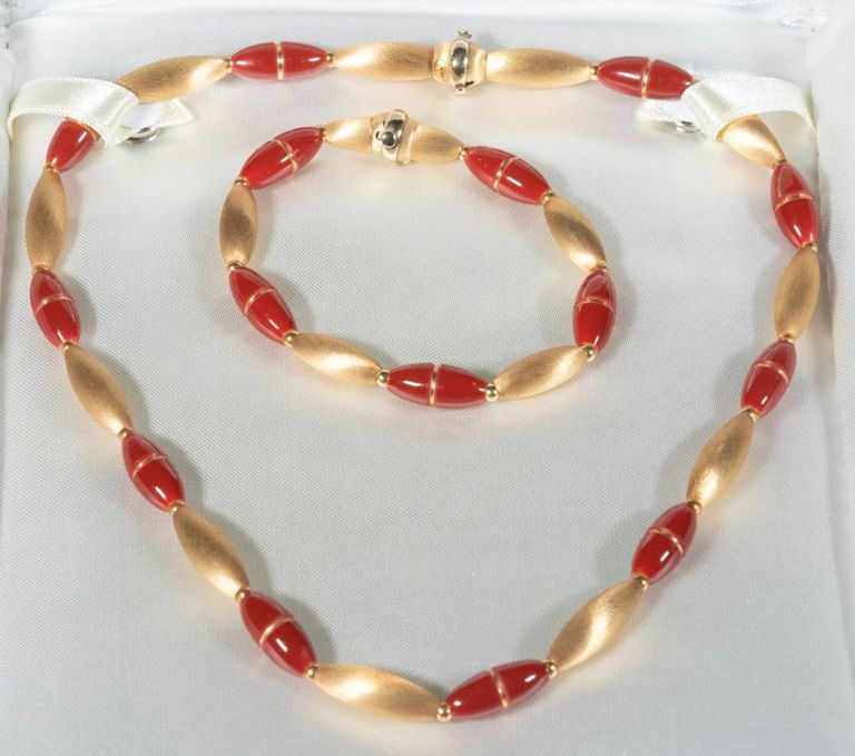 18k yellow gold and enamel necklace and matching bracelet