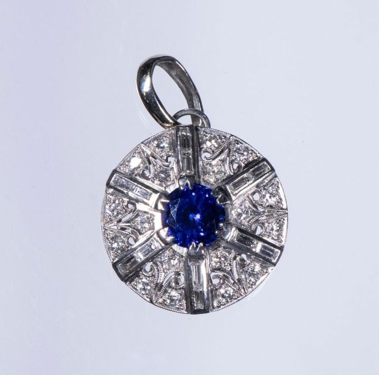 White gold diamond and synthetic sapphire pendant