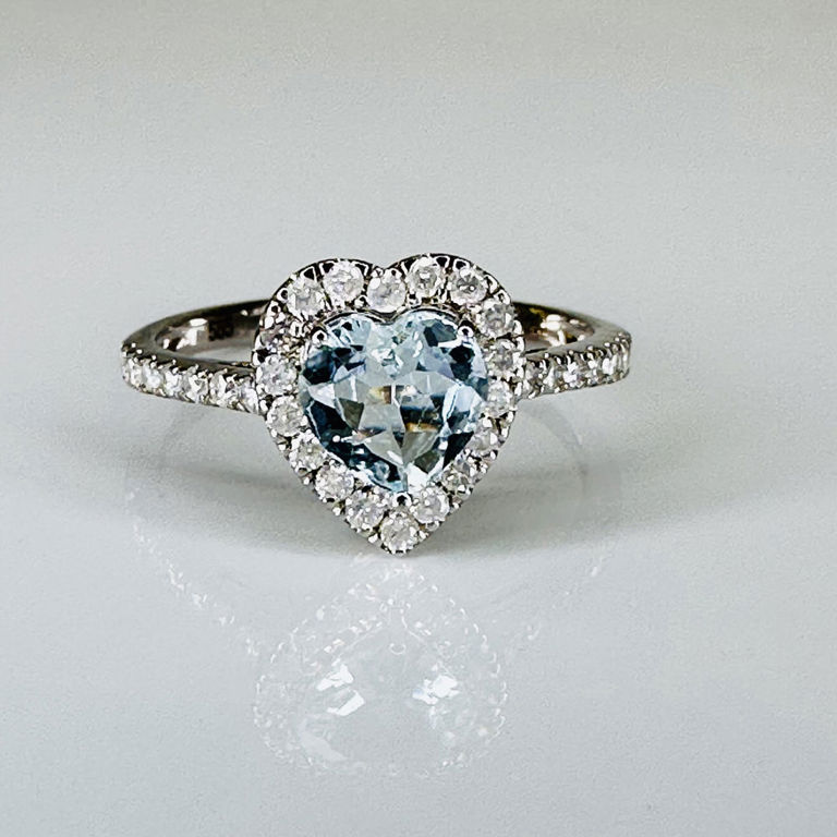 14k white gold aquamarine and diamond halo ring