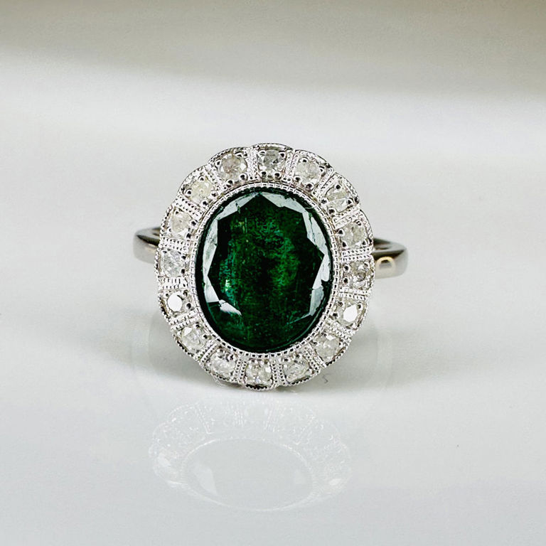 14k white gold emerald and diamond halo ring