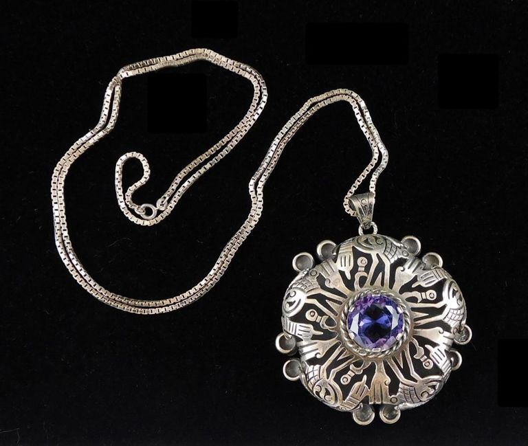 Sterling silver purple stone pendant on necklace