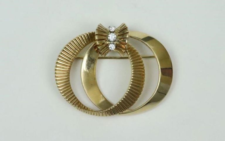 14k gold double circle pin with diamonds
