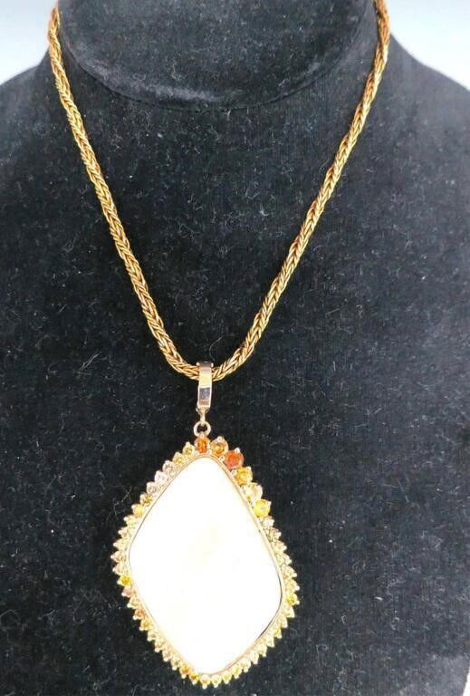 14k yellow gold opal and diamond pendant on necklace