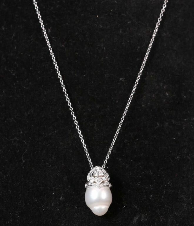 18k white gold pearl and diamond pendant on necklace
