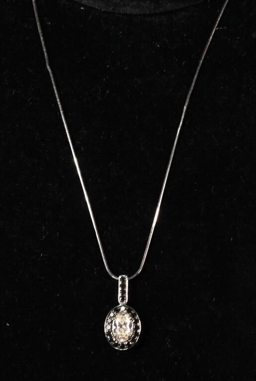 18k white gold diamond pendant on necklace