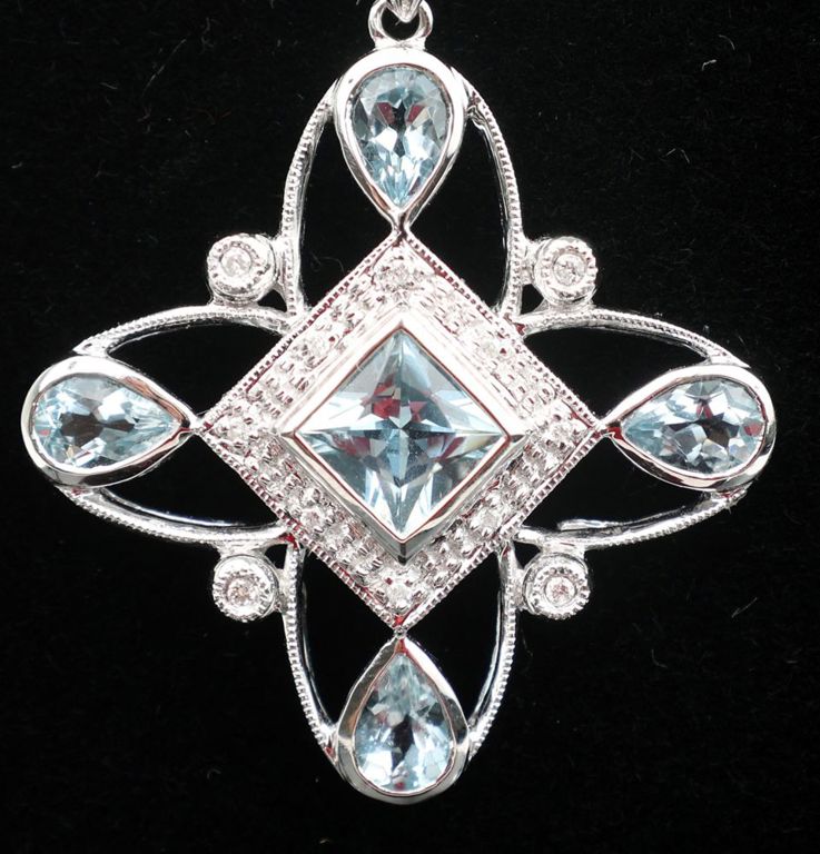 14k white gold aquamarine clover pendant on necklace