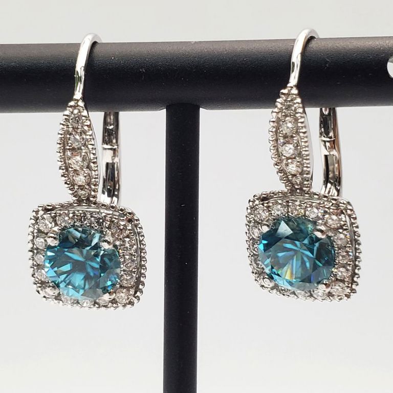 18k white gold blue zircon and diamond earrings