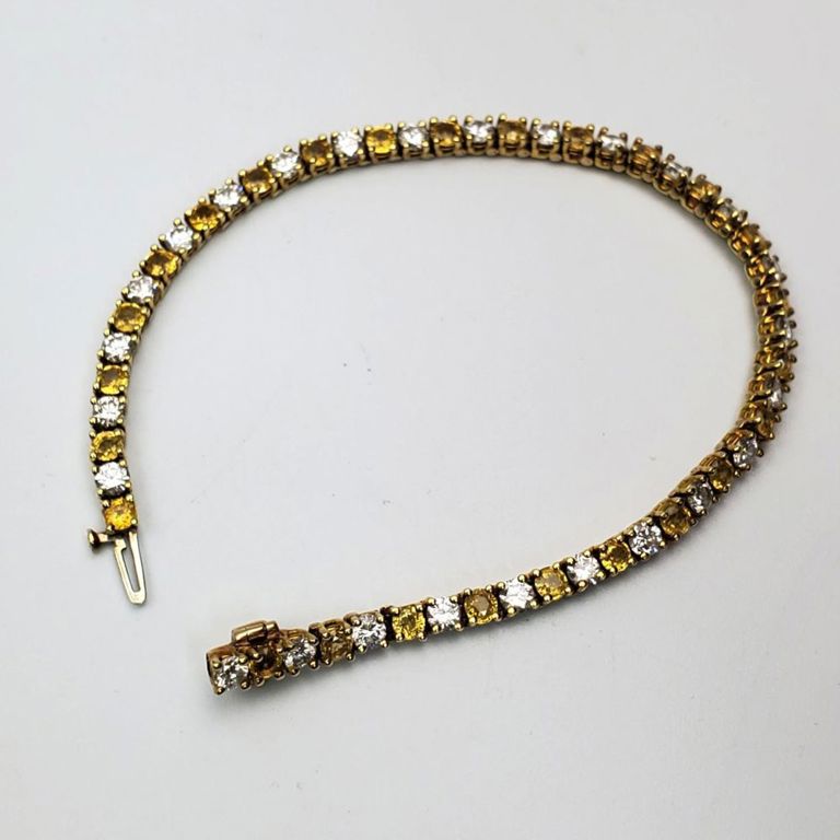 18k gold topaz and diamond tennis bracelet