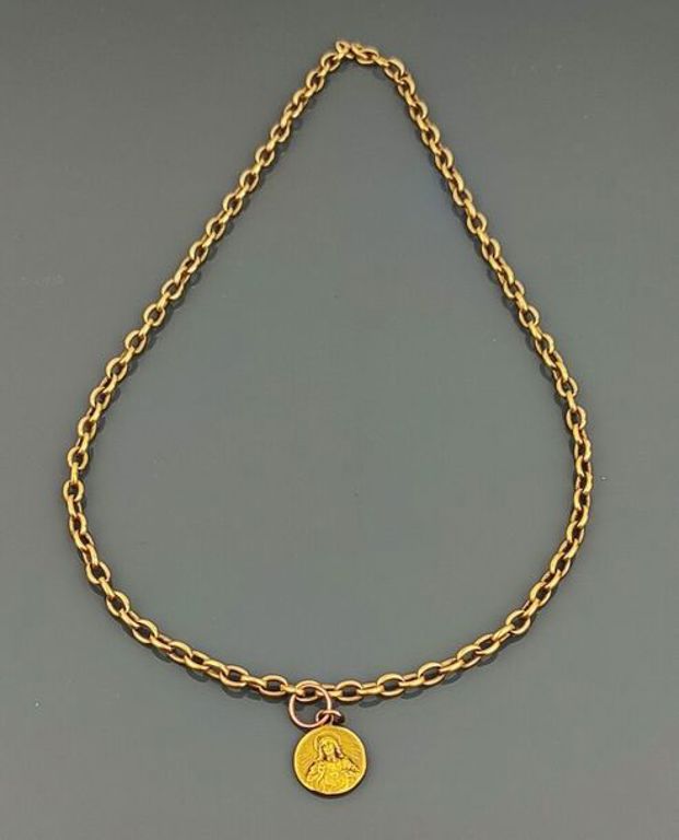 18k gold chain with medal