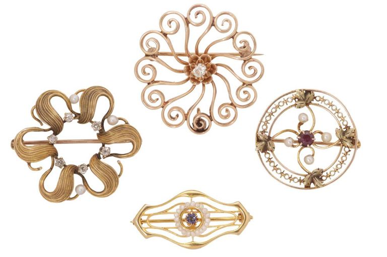 Gold gemstone brooches