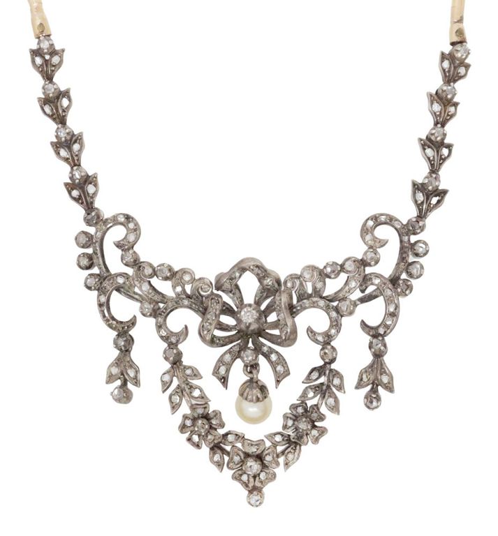 Silver diamond festoon pendant with 19k gold chain
