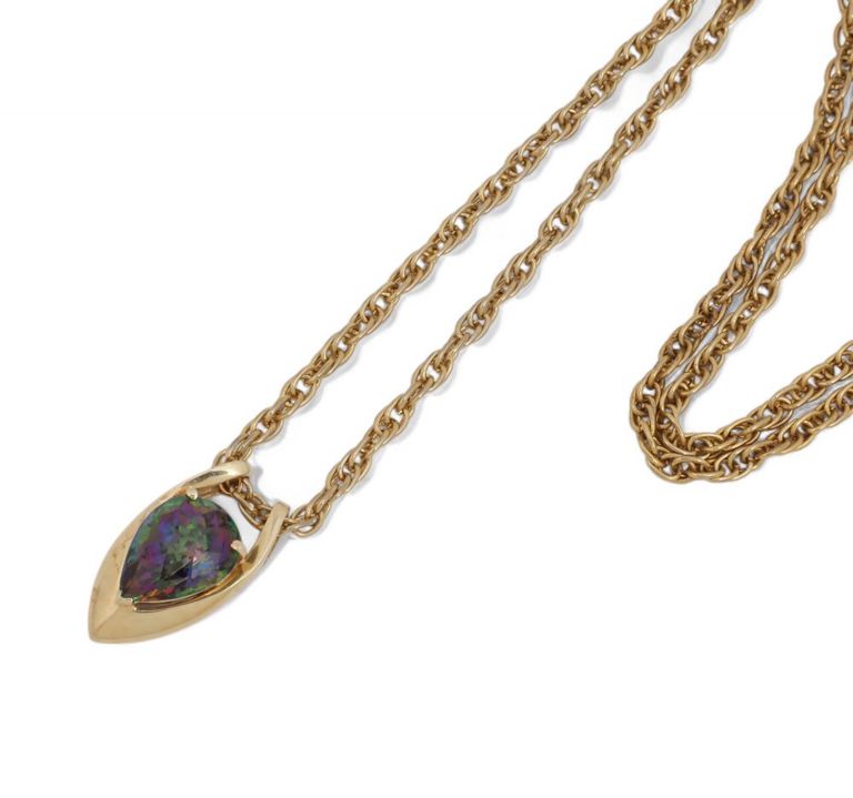 Gold pendant with iridescent stone on metal chain