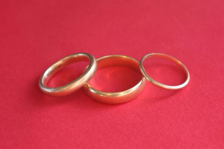 Three 22k yellow gold wedding bands