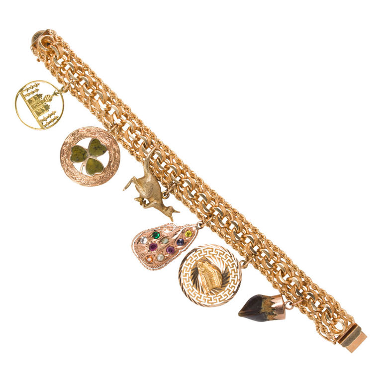 14k gold charm bracelet with mixed gold charms