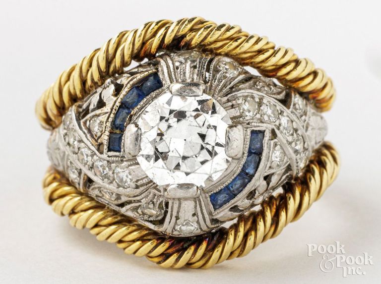 Platinum and 18k yellow gold diamond and sapphire ring