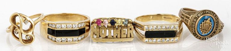 Five 14k and 10k yellow gold onyx and diamond rings