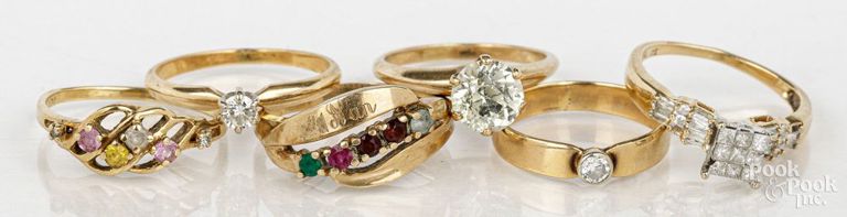 Six 14k and 10k yellow gold diamond rings