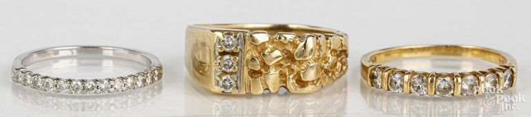 Three 14k gold diamond rings