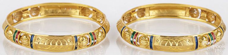 Two 18k yellow gold and enamel bangle bracelets