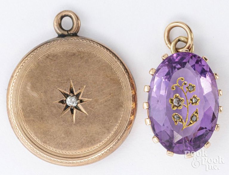 Two 14k gold diamond pendants