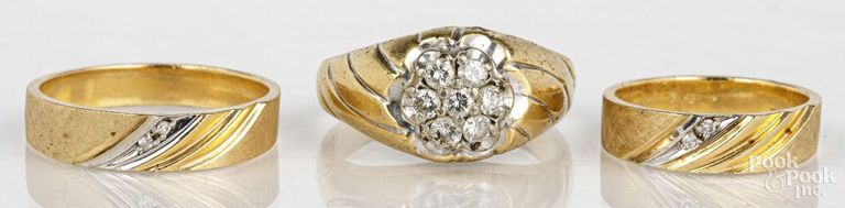 Three 14k yellow gold diamond rings