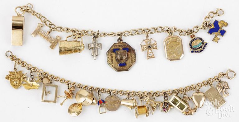 Two gold charm bracelets