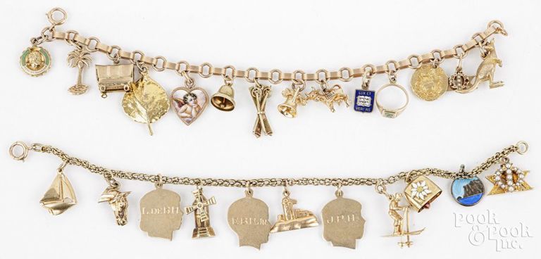 Two 14k gold charm bracelets