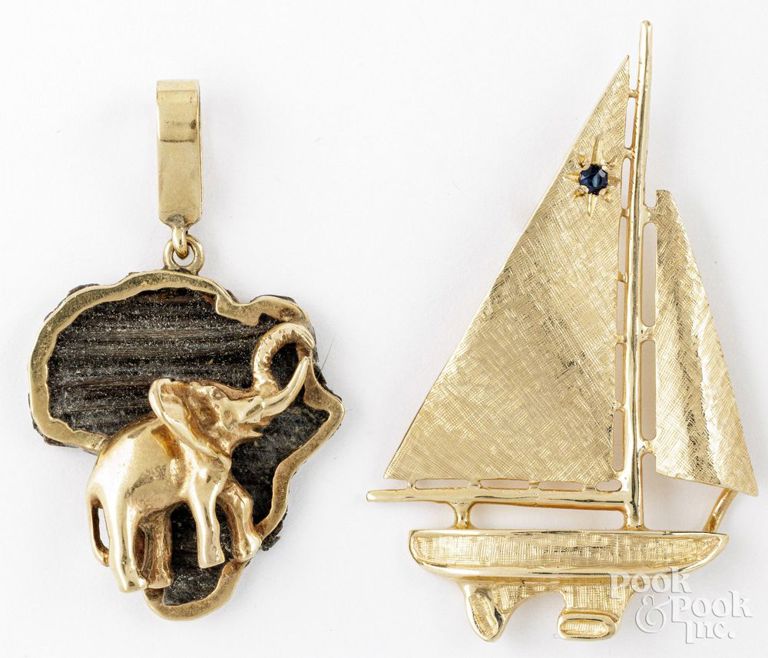 14k yellow gold sapphire brooch and 10k yellow gold pendant