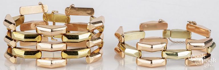 Two 14k two-tone gold link bracelets