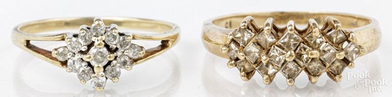 Two 10k yellow gold diamond rings
