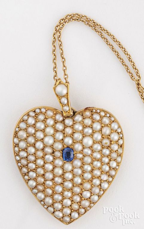 14k yellow gold pear andl sapphire locket pendant on necklace