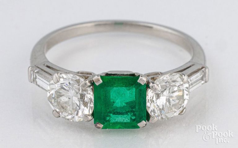 Platinum emerald and diamond three stone ring