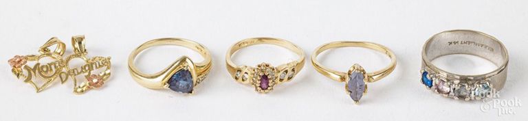 Four 14k gold multi stone rings and pendant