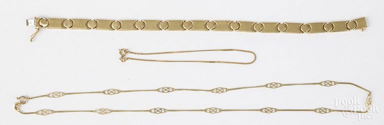 14k yellow gold necklace and two bracelets