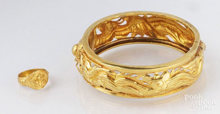 14k yellow gold bracelet and 24k gold ring