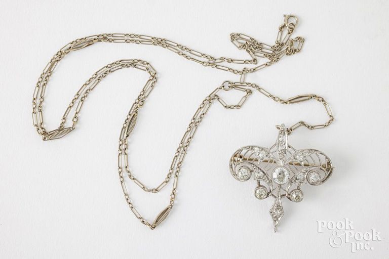14k white gold diamond pendant/brooch on necklace