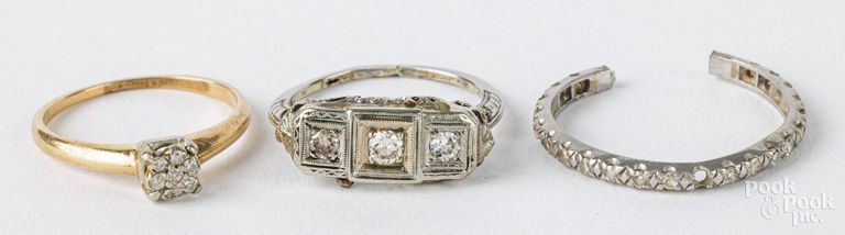 Three 18k and 14k gold diamond rings