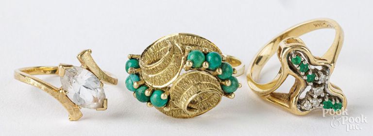 Three 14k yellow gold rings