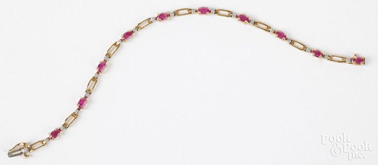 10k yellow gold diamond and ruby bracelet