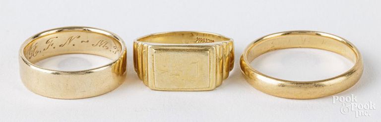Three 14k yellow gold rings