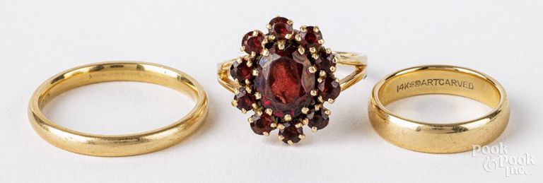 Three 14k yellow gold rings