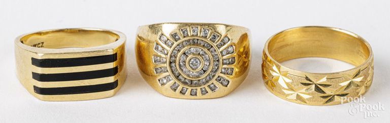 Three 14k yellow gold rings