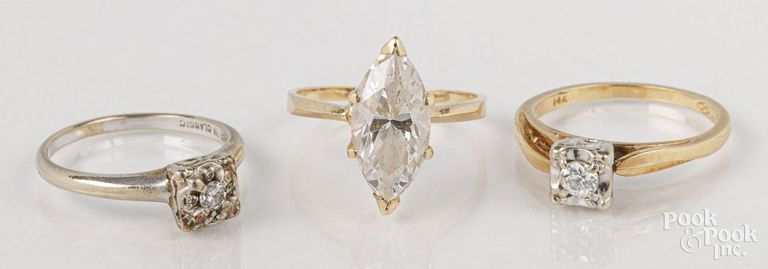 Three 14k yellow gold rings