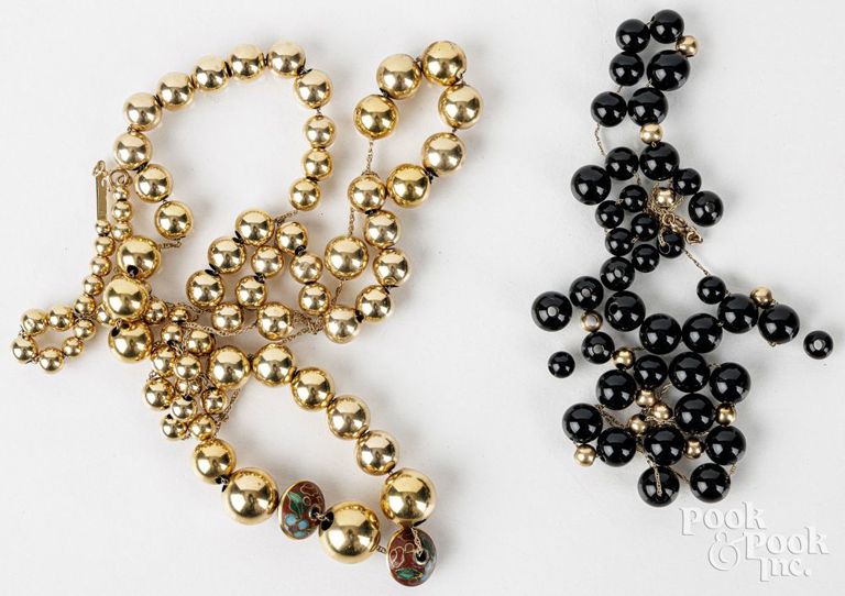 Two 14k yellow gold bead necklaces